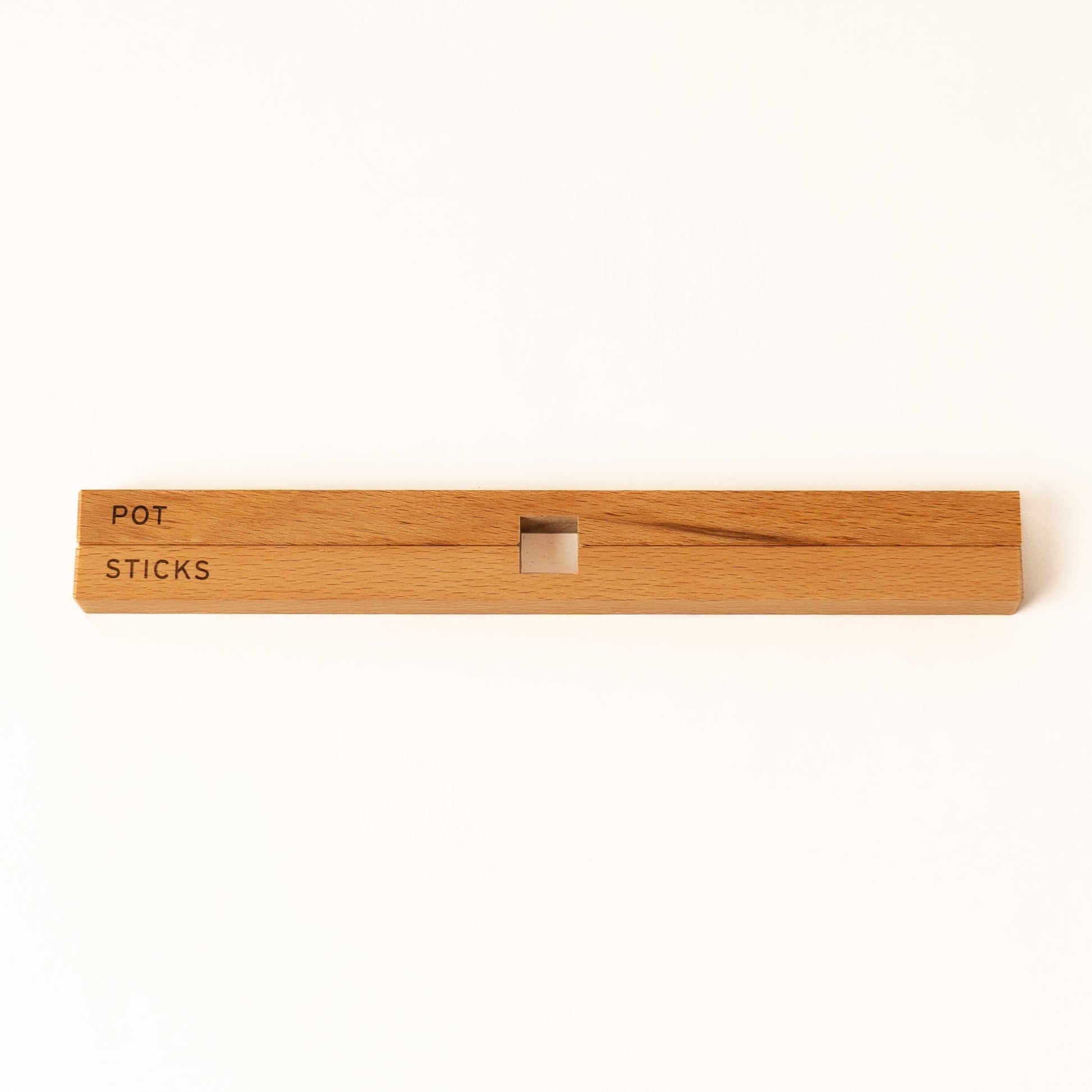 Untersetzer aus massiver Buche zum zusammen klappen