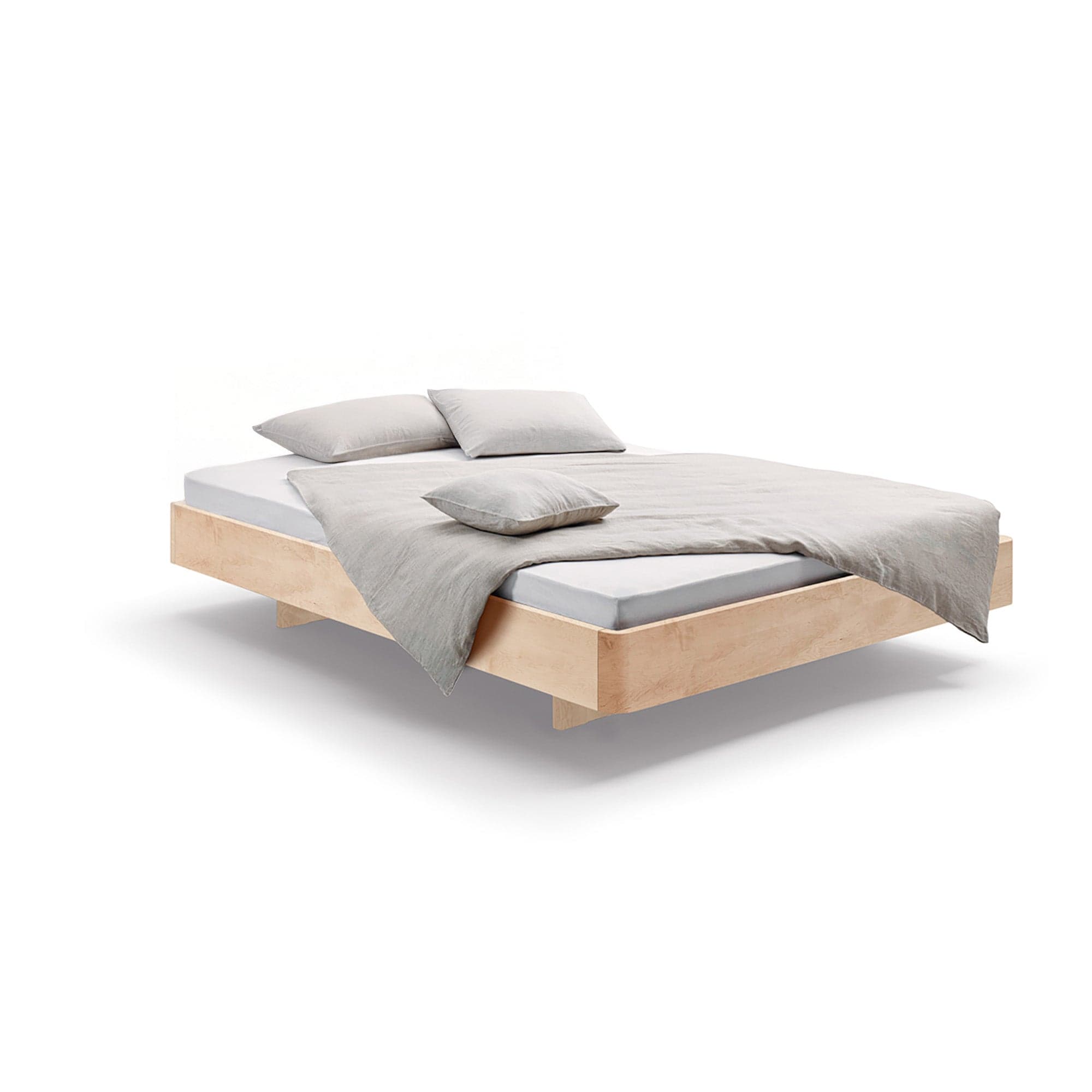 Holzmanufaktur Bett COM:CI Massivholzbett auf Holzkufen