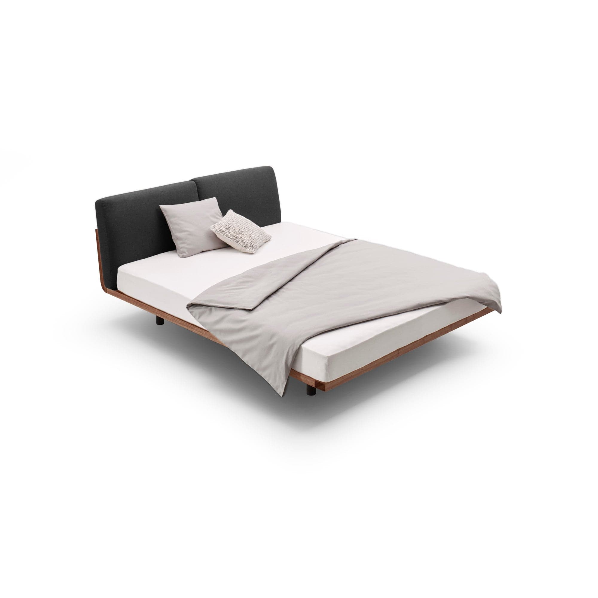 Schwebende Betten SWING der Holzmanufaktur: Designer Betten aus Wildeiche Massivholz mit Polster-Rückenlehne aus Naturmaterialien.