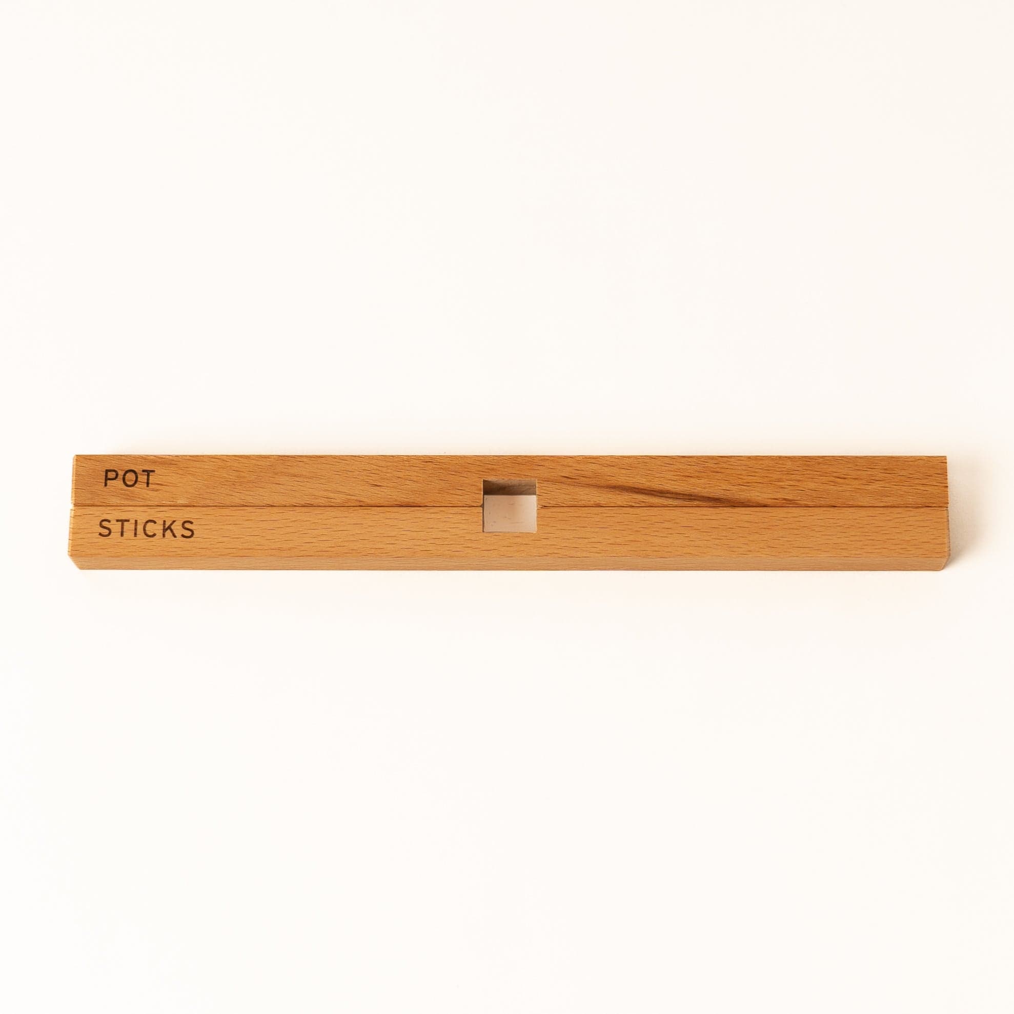 Untersetzer aus massiver Buche zum zusammen klappen