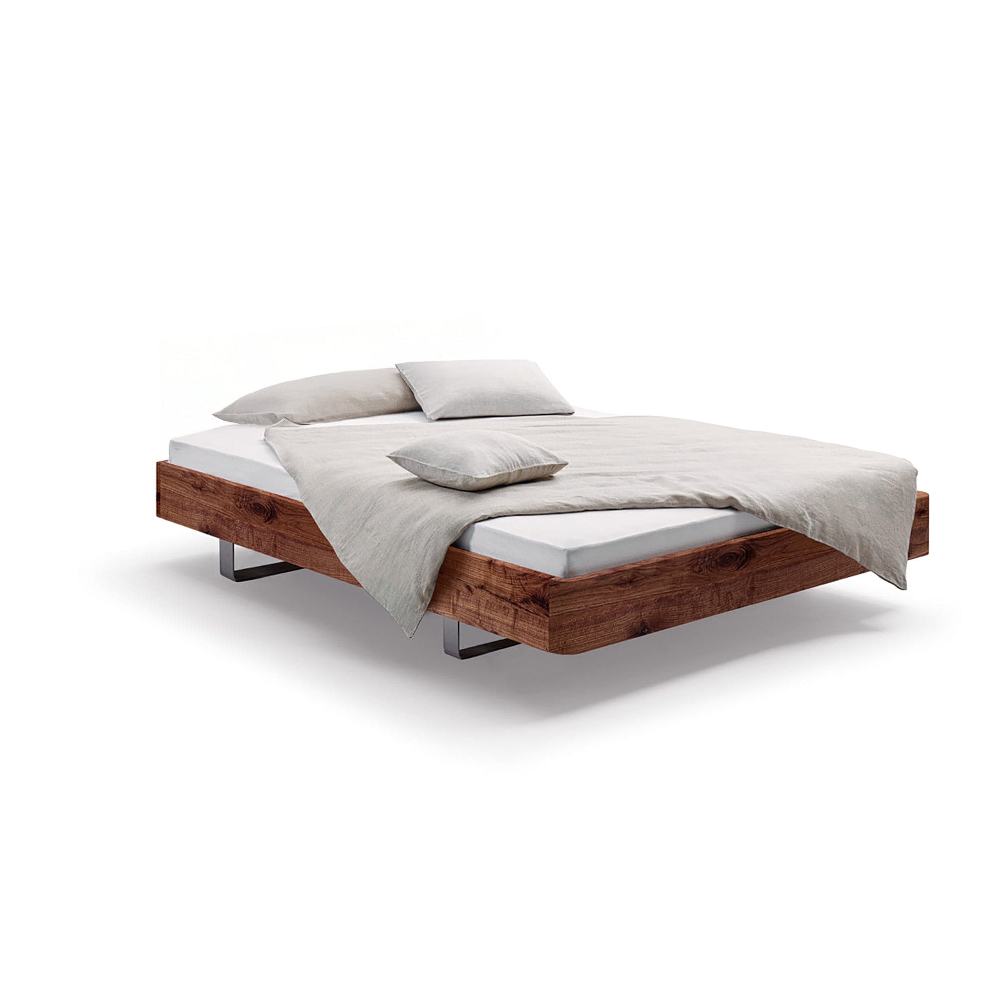 Holzmanufaktur Bett Com:Ci Massivholzbett auf Edelstahlkufen