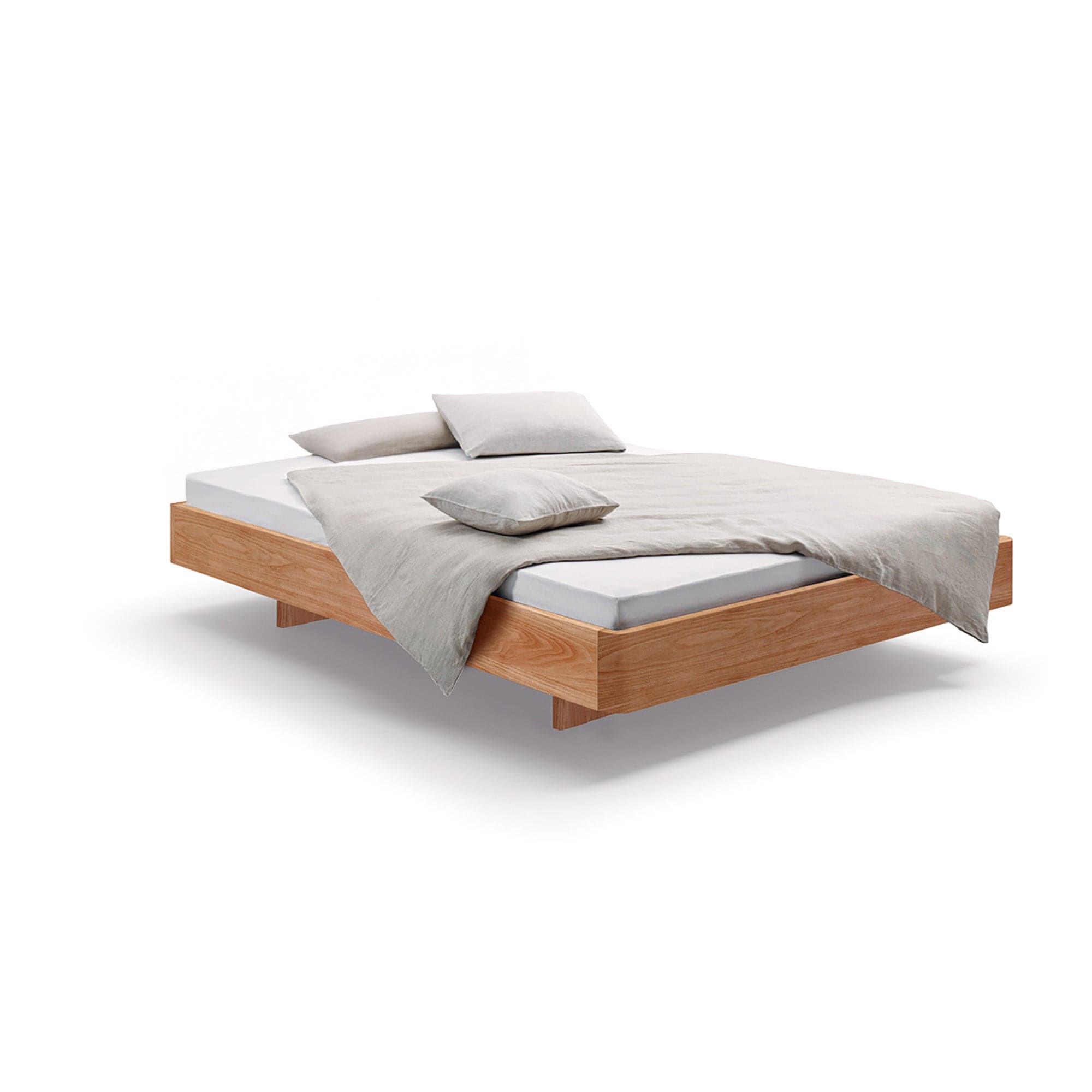 Holzmanufaktur Bett COM:CI Massivholzbett auf Holzkufen