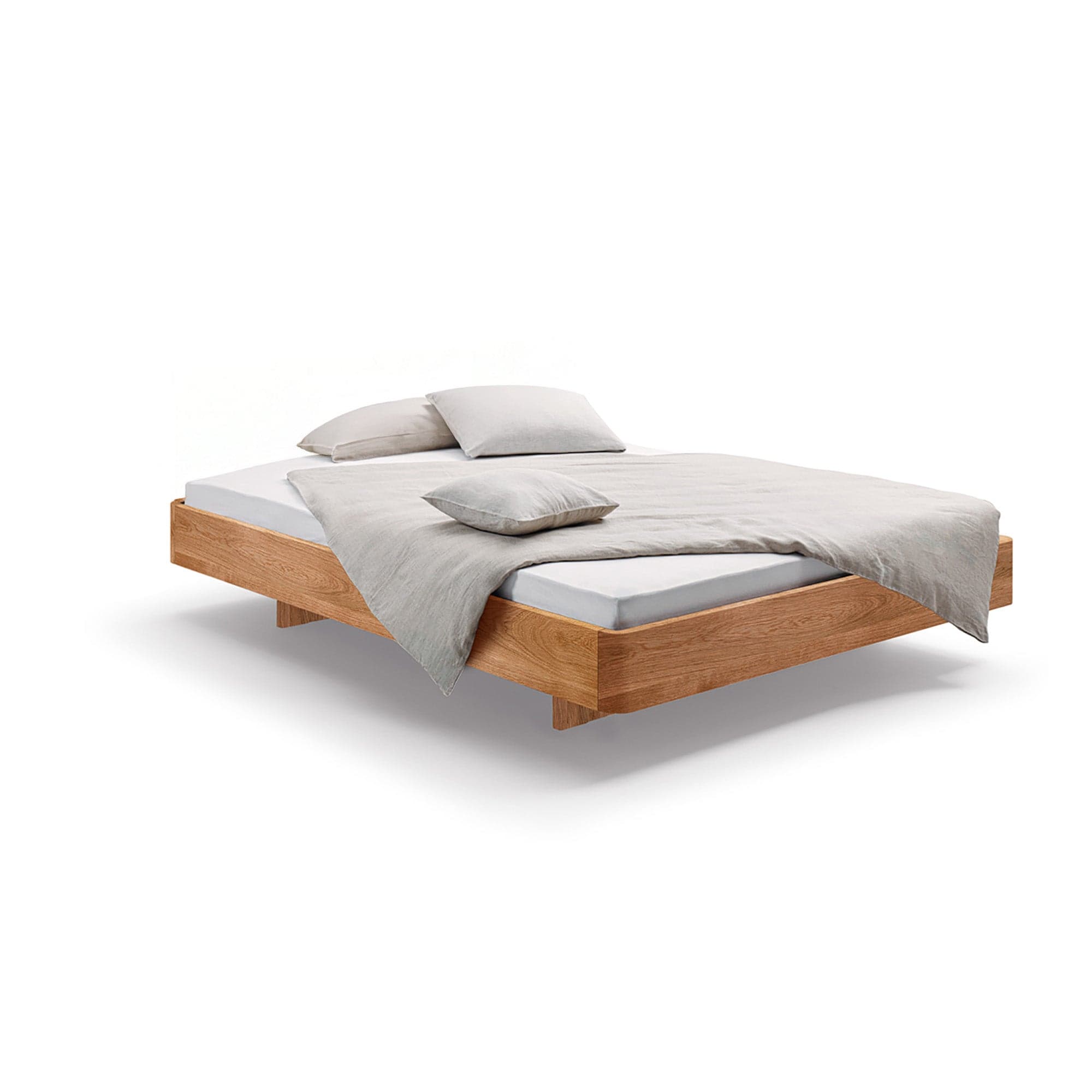 Holzmanufaktur Bett COM:CI Massivholzbett auf Holzkufen