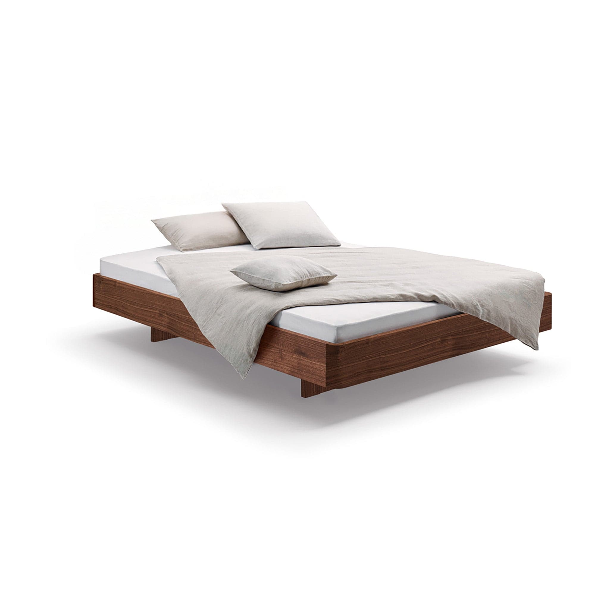 Holzmanufaktur Bett COM:CI Massivholzbett auf Holzkufen