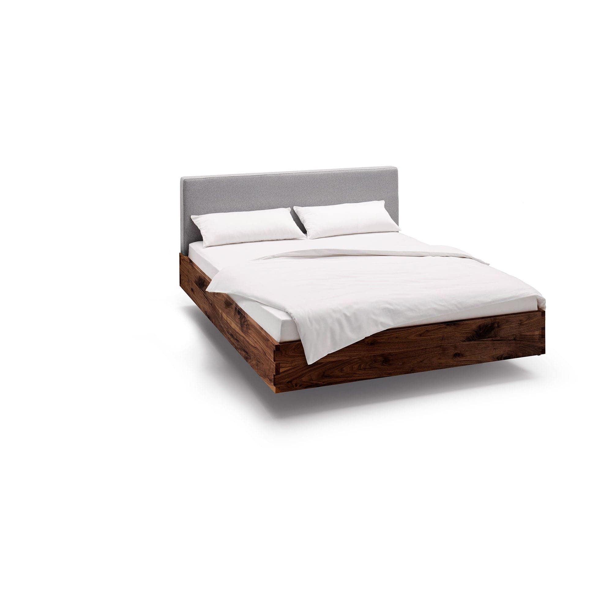 NAP Massivholzbett mit Polsterkopfteil aus Wildnuss