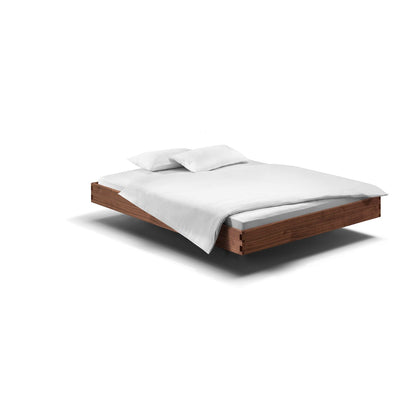 Holzmanufaktur Massivholzbett, ein hochwertiges schwebend leichtes Bett aus Eiche