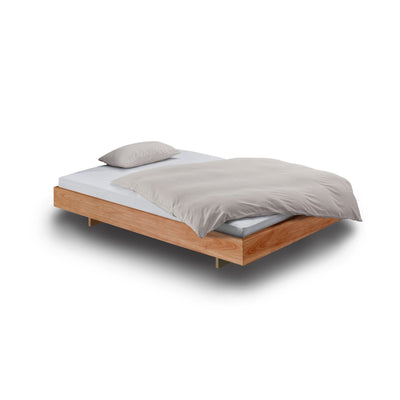 Step-G Bett auf Holzkufen