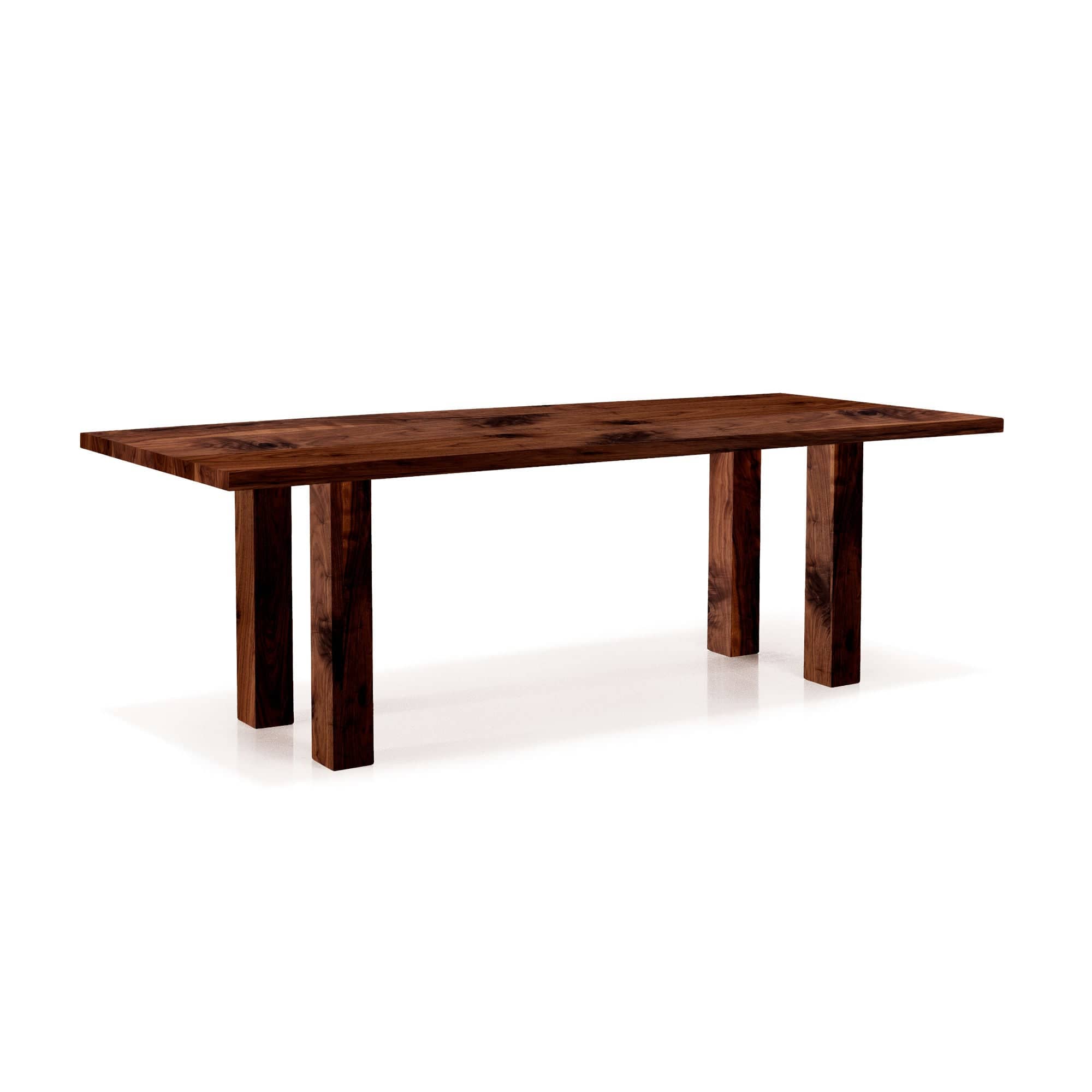 massiver Esstisch in wildem Nussbaum Holz